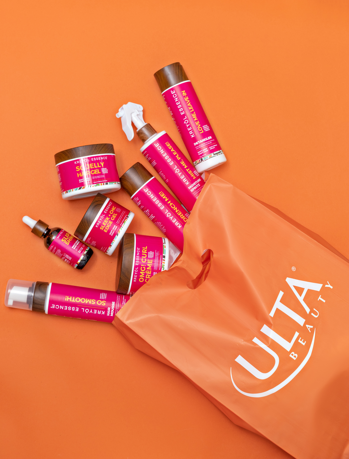 Kreyòl Essence product collection with an Ulta Beauty shopping bag